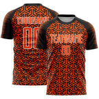 Custom Black Orange-White Geometric Arrow Sublimation Soccer Uniform Jersey