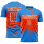 Custom Powder Blue Orange-White Abstract Splatter Grunge Art Sports Sublimation Soccer Uniform Jersey