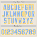 Custom Cream Light Blue White-Gold Authentic Two Tone Baseball Jersey